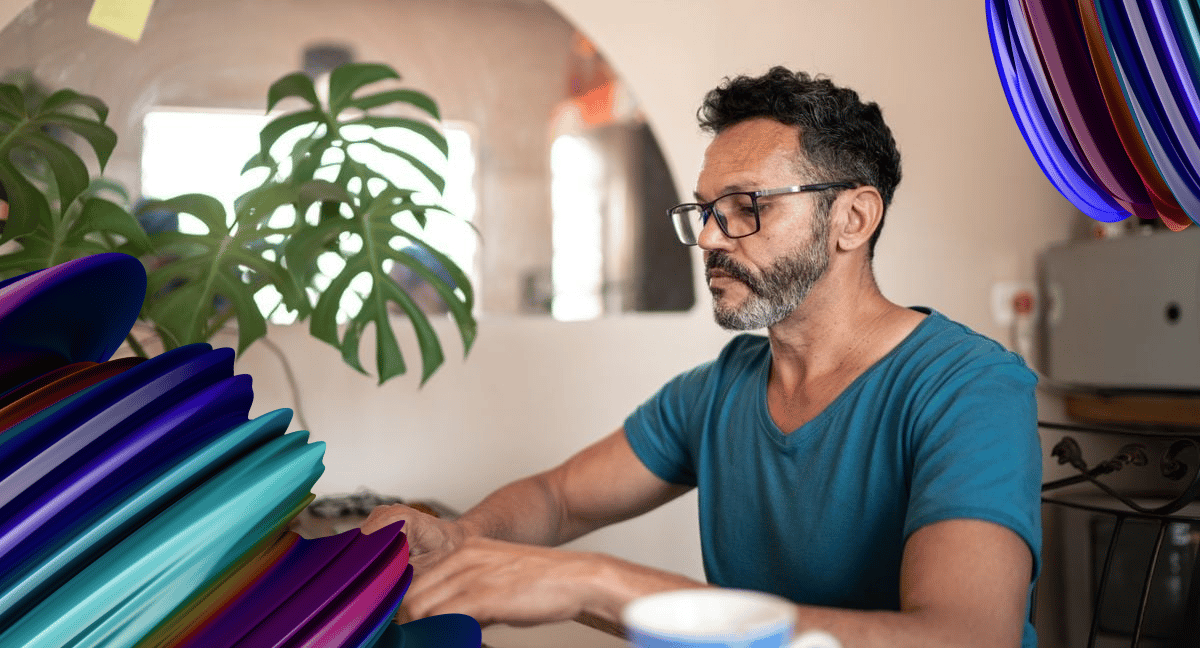 A contingent worker is finishing a task at his desk while working from home.