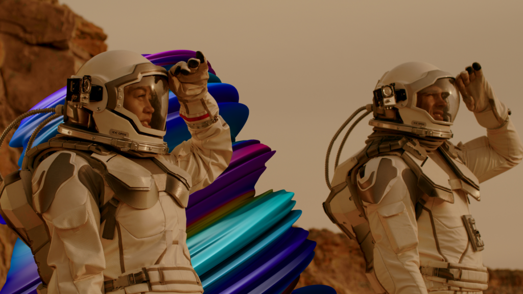 Two astronauts taking a look at a new planet, suggesting the exploration of new technologies like generative AI.